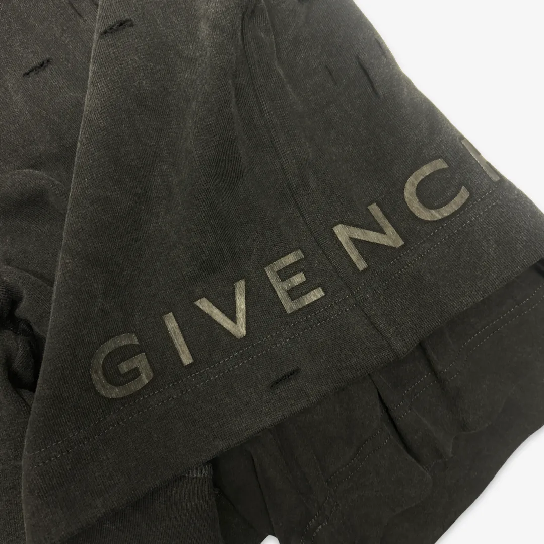 Givenchy men's black cotton distressed double-layer shorts